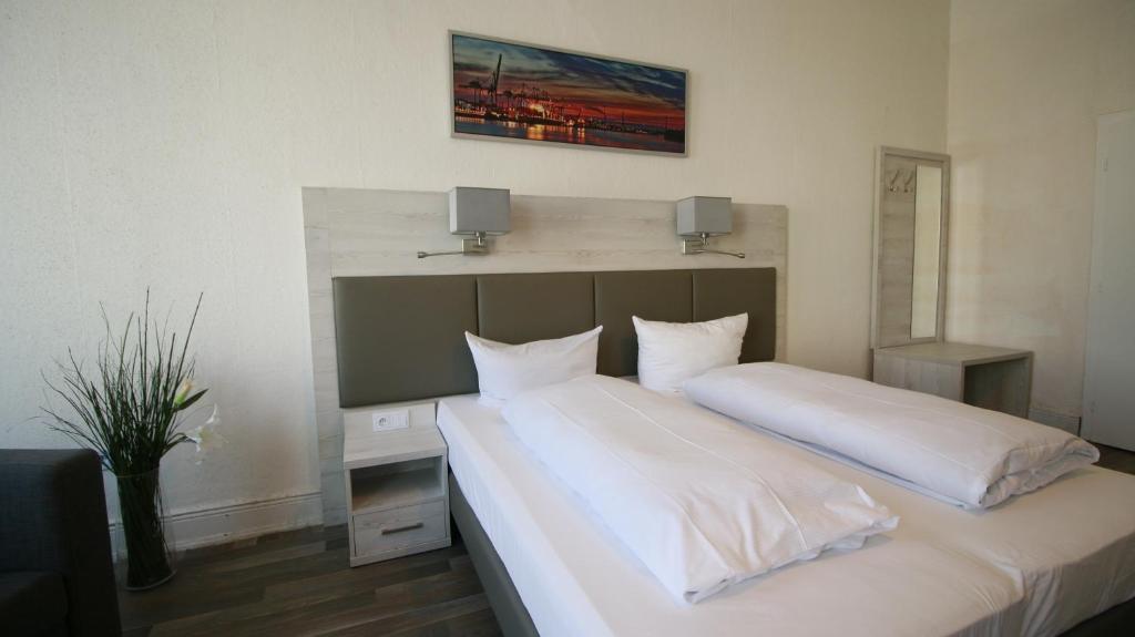 Postel nebo postele na pokoji v ubytování Hotel Bee Fang