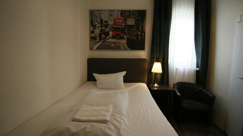 Postel nebo postele na pokoji v ubytování Hotel Bee Fang
