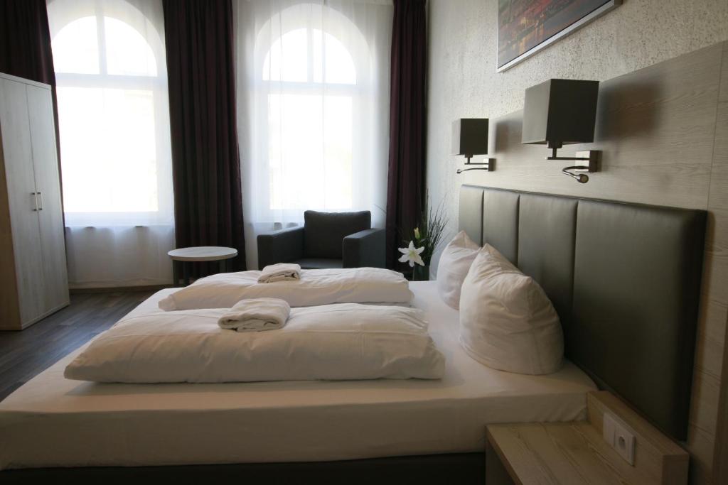 Postel nebo postele na pokoji v ubytování Hotel Bee Fang