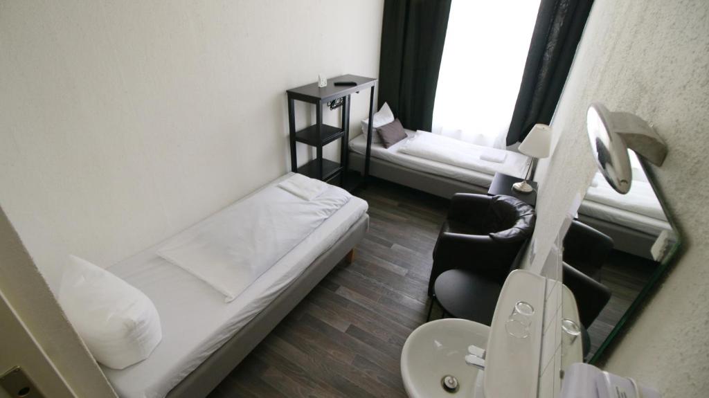 Postel nebo postele na pokoji v ubytování Hotel Bee Fang