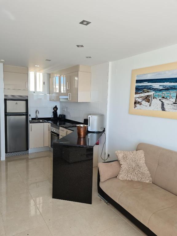 A kitchen or kitchenette at Room in Apartment - 1st line top floor apartment