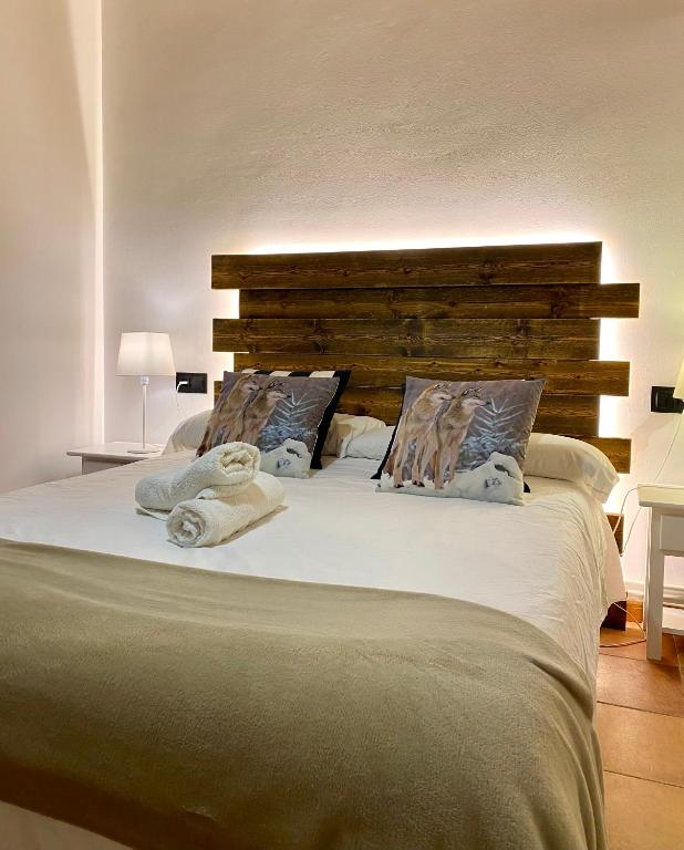 Posteľ alebo postele v izbe v ubytovaní Apartaments Alta Muntanya