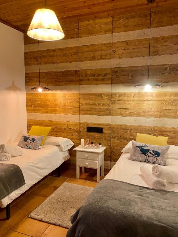 Posteľ alebo postele v izbe v ubytovaní Apartaments Alta Muntanya