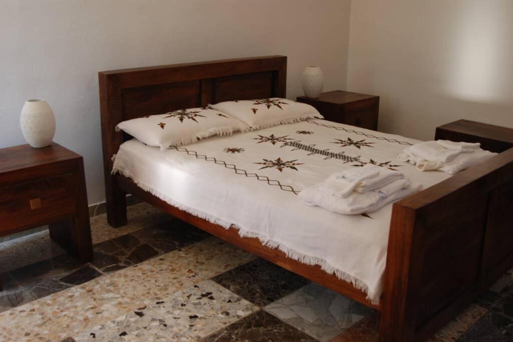 A bed or beds in a room at Trullo Marianna