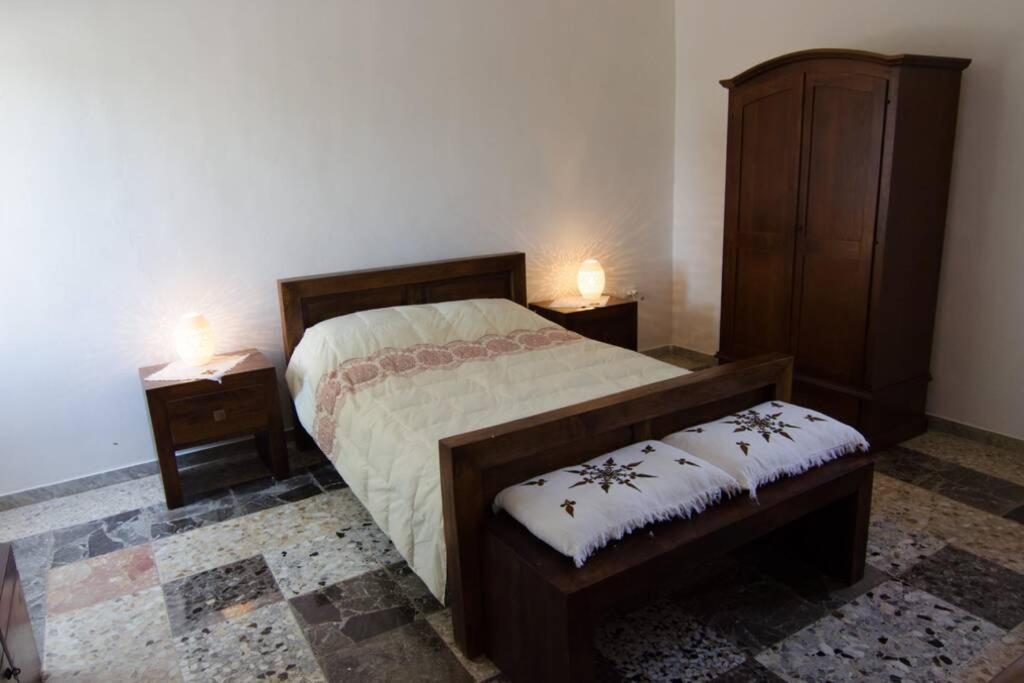 A bed or beds in a room at Trullo Marianna