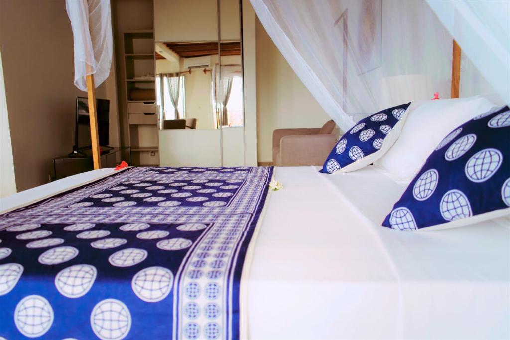 Postel nebo postele na pokoji v ubytování Al Camar Lodge