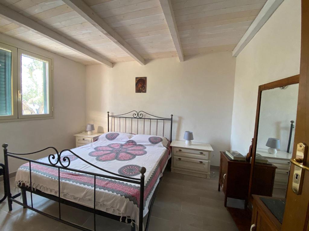 Postel nebo postele na pokoji v ubytování Uliveto Nonno Giacomo