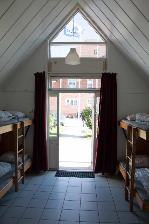 Postel nebo postele na pokoji v ubytování Danhostel Helsingør