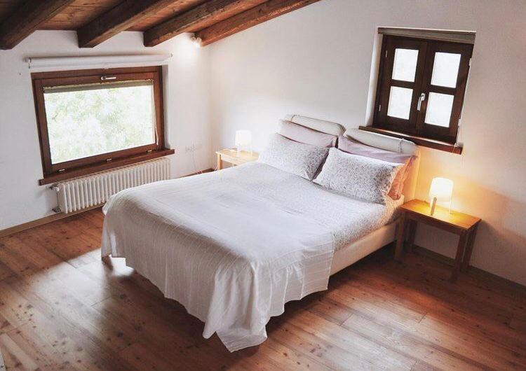 Postel nebo postele na pokoji v ubytování Casa Griunit