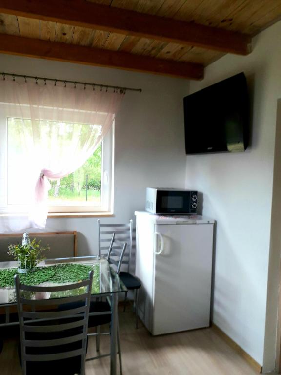 Kuchyňa alebo kuchynka v ubytovaní Kaszubska Dolina Pięciu Stawów