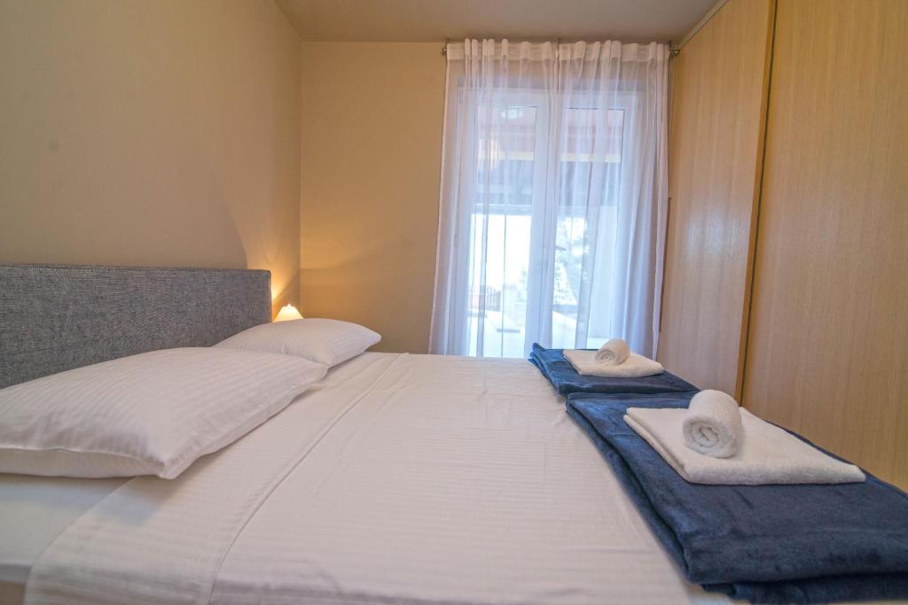 Postel nebo postele na pokoji v ubytování Jelena B4