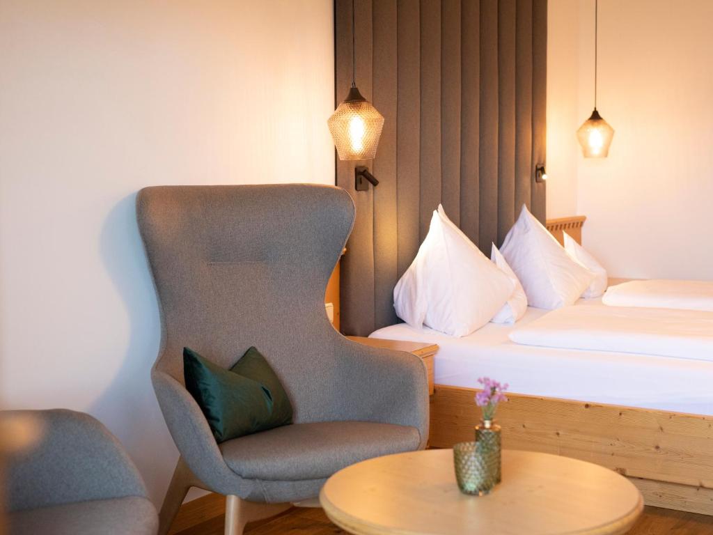 Postel nebo postele na pokoji v ubytování Hotel Weingut Innerleiterhof