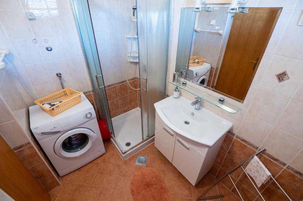 Koupelna v ubytování Apartments Onorina