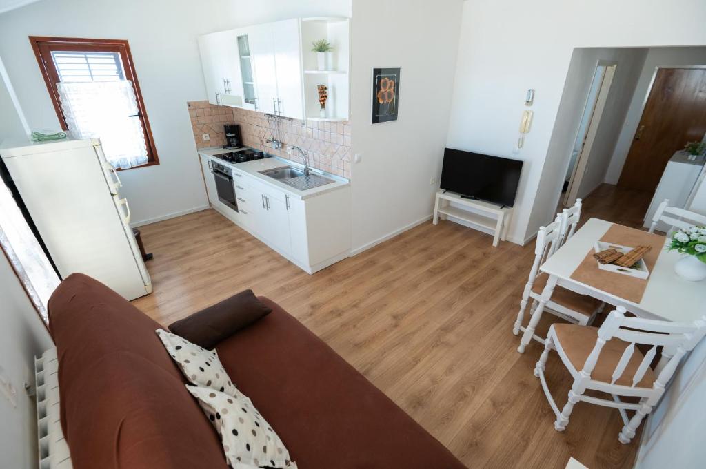 Kuchyň nebo kuchyňský kout v ubytování Apartments Onorina