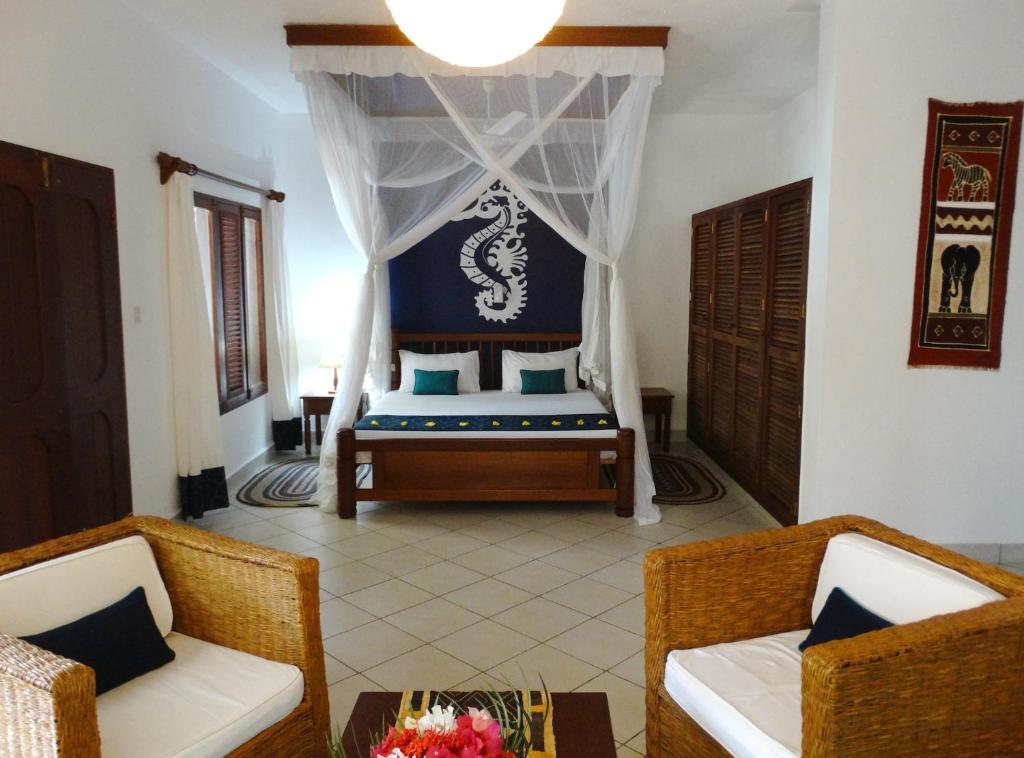 Posezení v ubytování Diani Cottages