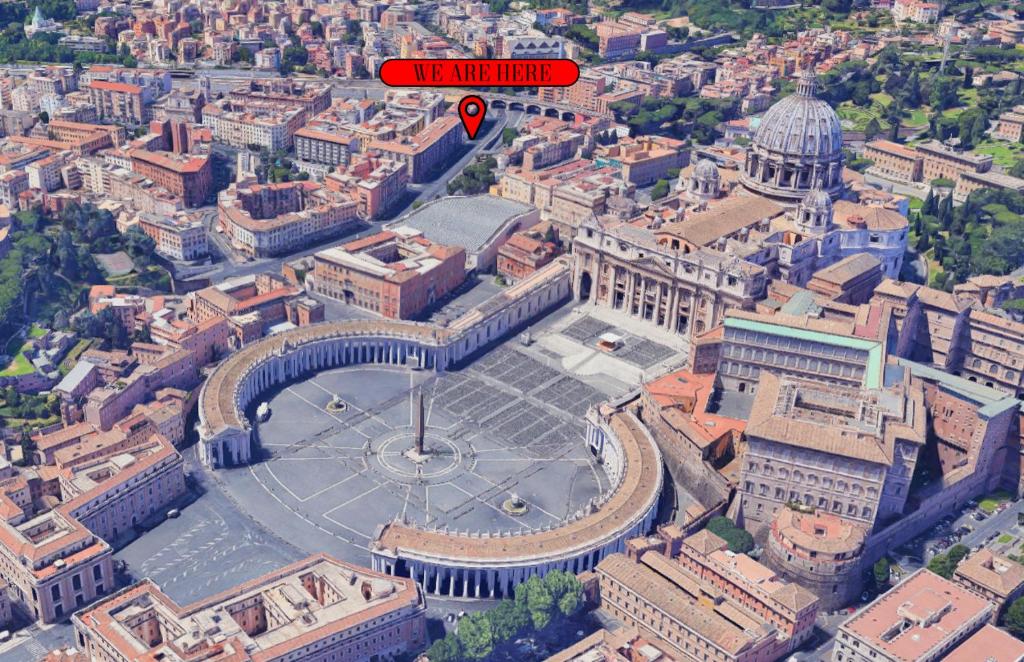 an aerial view of a large city with a building at FREE BREAKFAST - Michelangelo Dream House in Rome