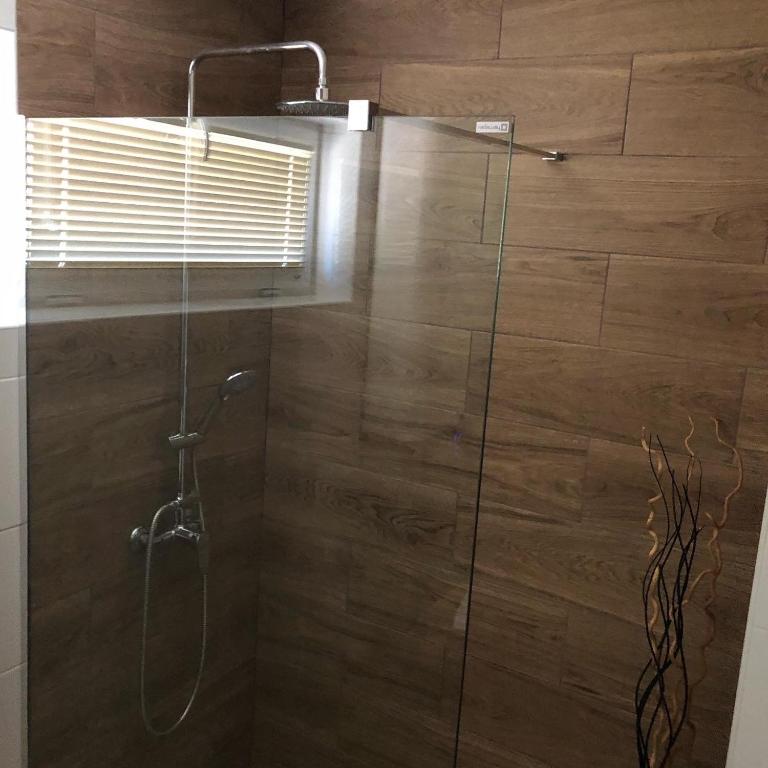 Kúpeľňa v ubytovaní Bier-Lak Apartman House 71