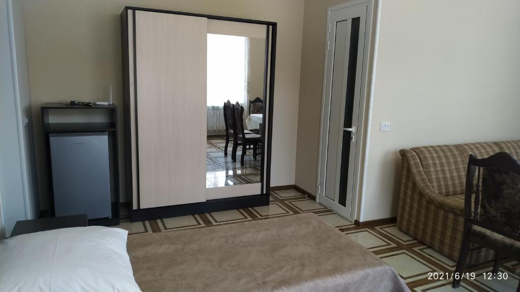 Postel nebo postele na pokoji v ubytování Erazank Hotel