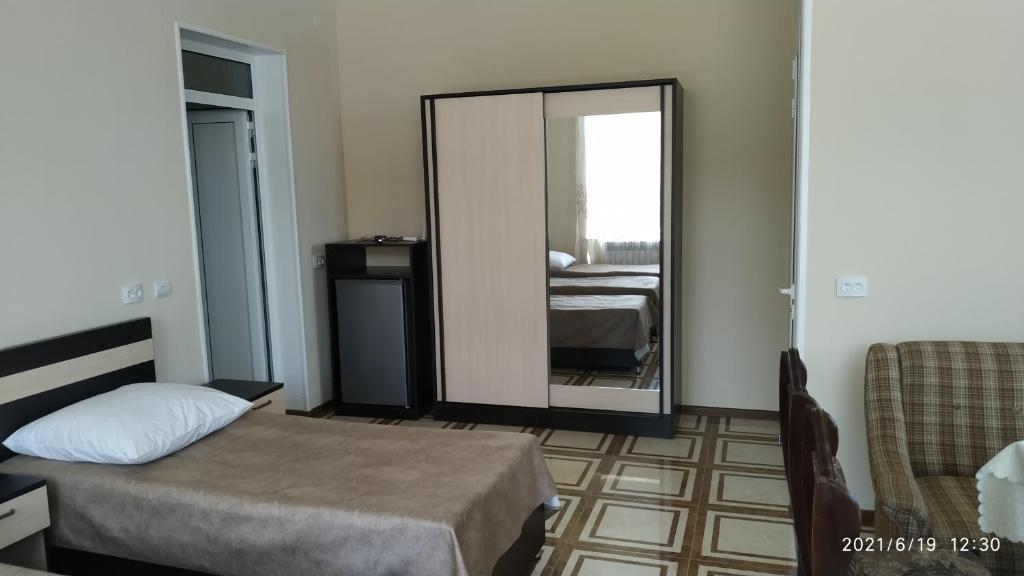 Postel nebo postele na pokoji v ubytování Erazank Hotel