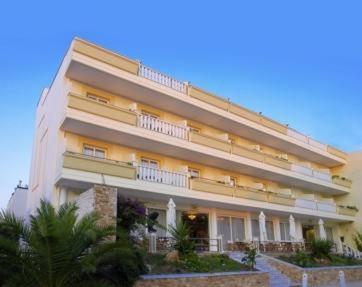 a large building with balconies on the side of it at Laodamia Hotel in Nea Anchialos