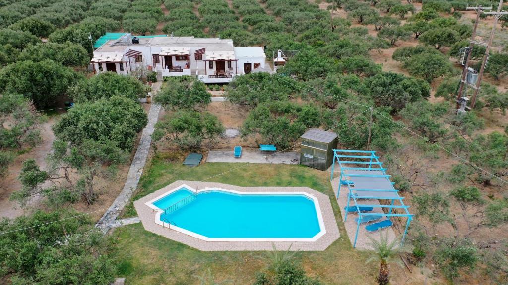 an aerial view of a house with a swimming pool at Voula's Casa Di Mare in Palekastron