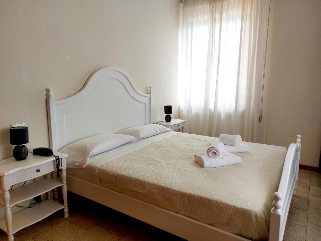 Postel nebo postele na pokoji v ubytování Hotel Valbella