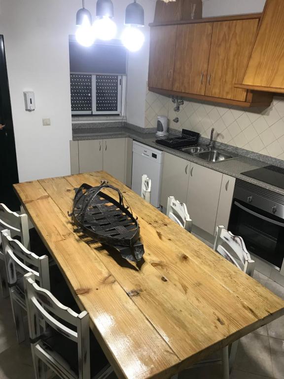 Kuchyň nebo kuchyňský kout v ubytování Casa da Aldeia
