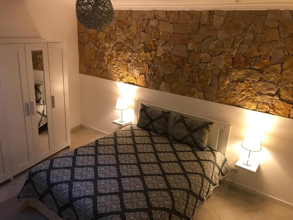 Postel nebo postele na pokoji v ubytování Casa da Aldeia
