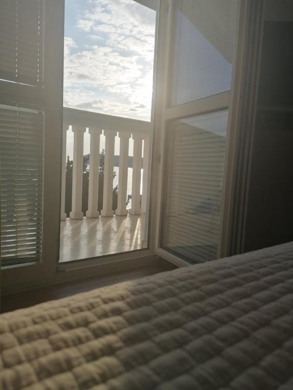 Postel nebo postele na pokoji v ubytování Guest house Perović