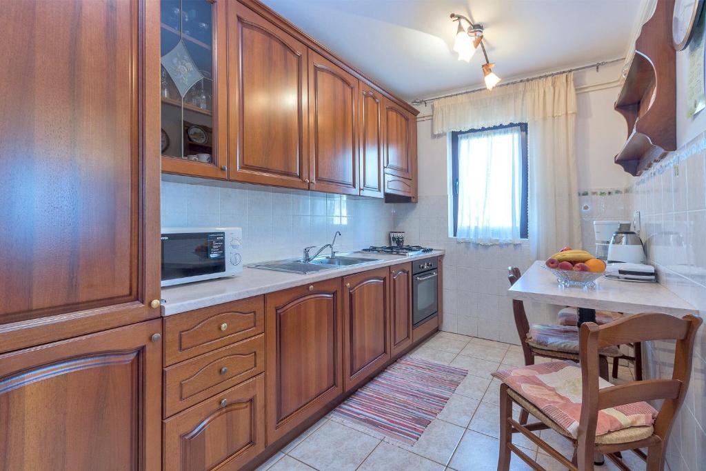 Kuchyň nebo kuchyňský kout v ubytování Apartments Istra Croatia