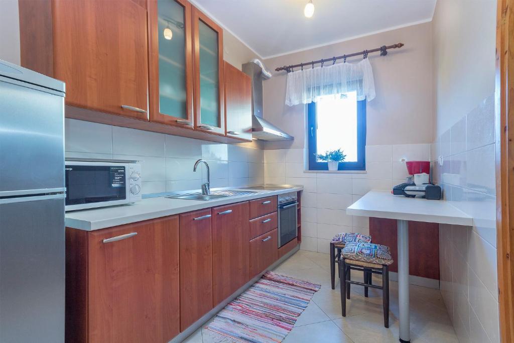 Kuchyň nebo kuchyňský kout v ubytování Apartments Istra Croatia