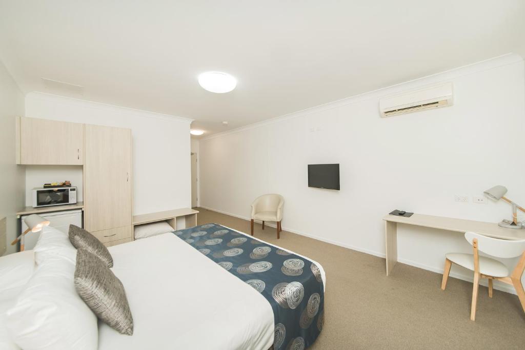 Kuchyň nebo kuchyňský kout v ubytování The Coast Motel