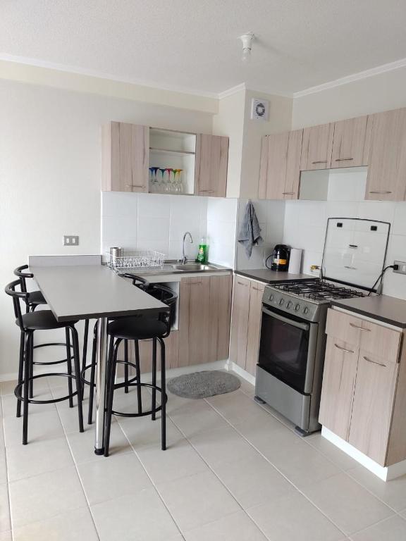 Kuchyň nebo kuchyňský kout v ubytování New Relax Departamento