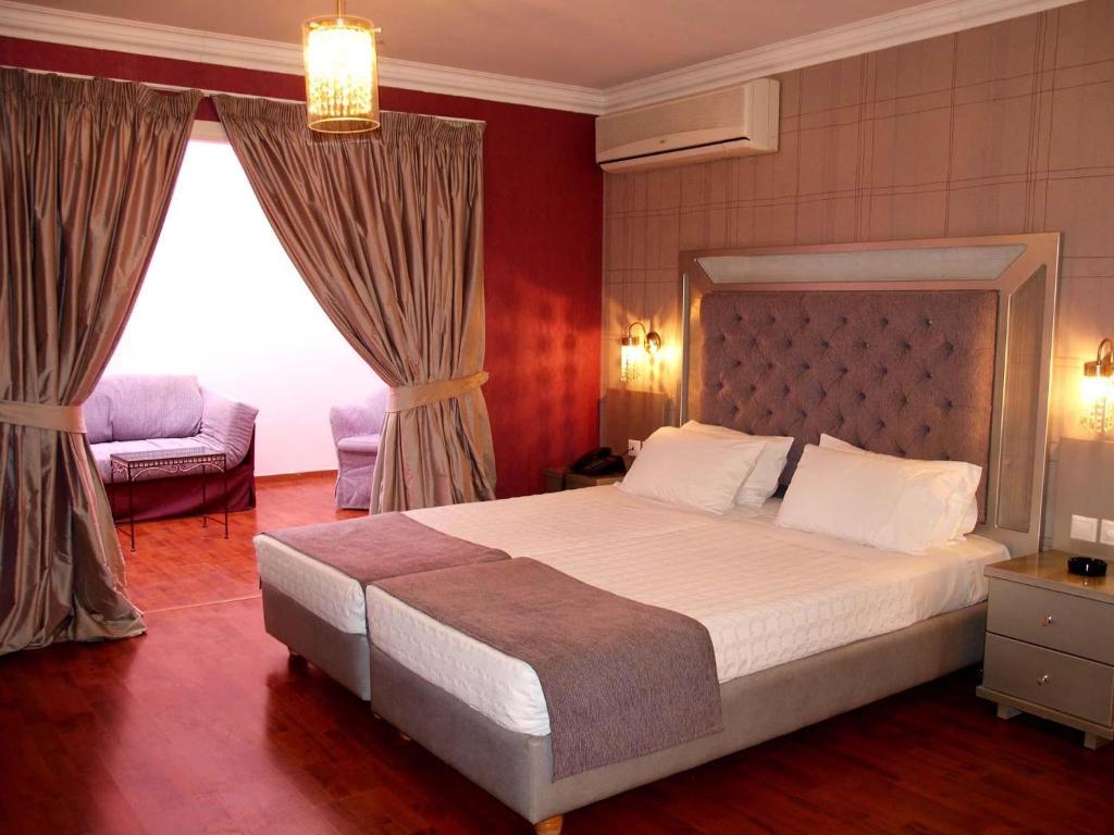 Letto o letti in una camera di Delphi Art Hotel by Prima Hotels