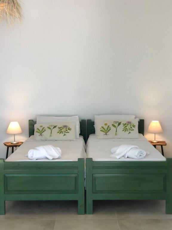 Postel nebo postele na pokoji v ubytování Marina Vista Luxury Studio suites Beach front
