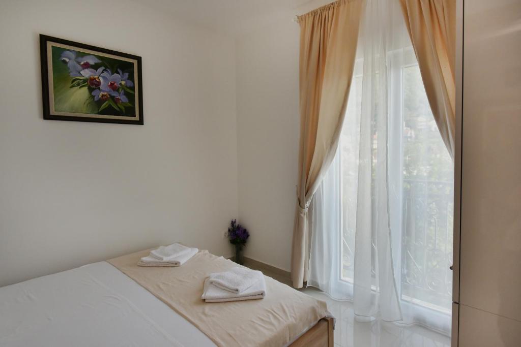 Postel nebo postele na pokoji v ubytování Villa Julia