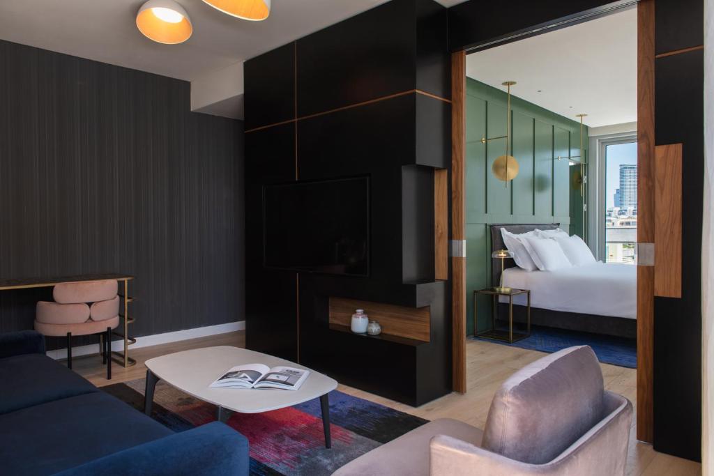 Postel nebo postele na pokoji v ubytování Ink Hotel Tel Aviv