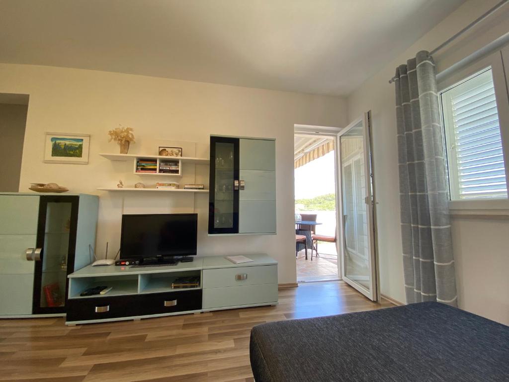 Telewizja i/lub zestaw kina domowego w obiekcie Villa Laguna