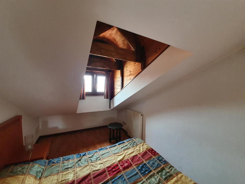 Postel nebo postele na pokoji v ubytování Villa Berghinz