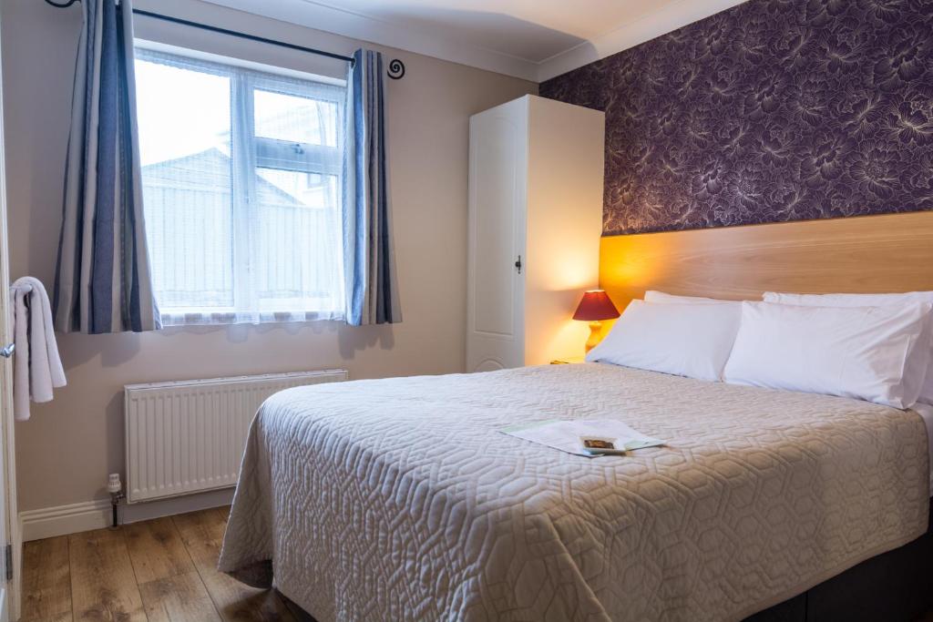 Postel nebo postele na pokoji v ubytování Seacrest B&B