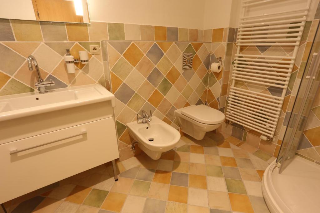 Koupelna v ubytování Hotel Hajčman