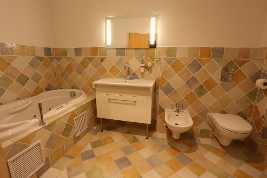 Koupelna v ubytování Hotel Hajčman