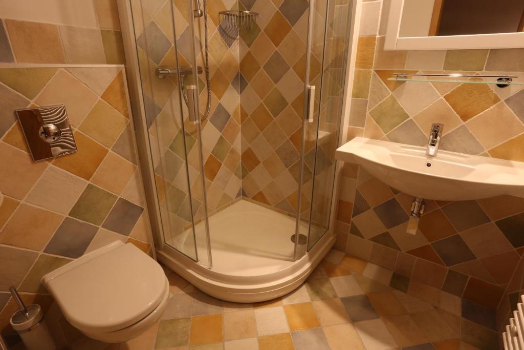Koupelna v ubytování Hotel Hajčman