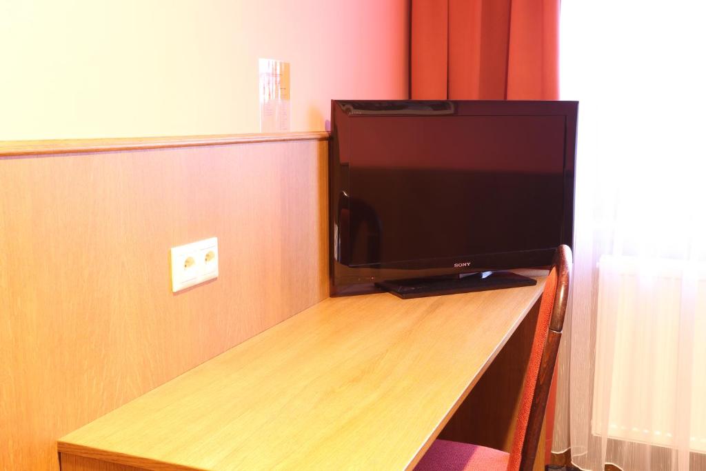 TV a/nebo společenská místnost v ubytování Hotel Hajčman