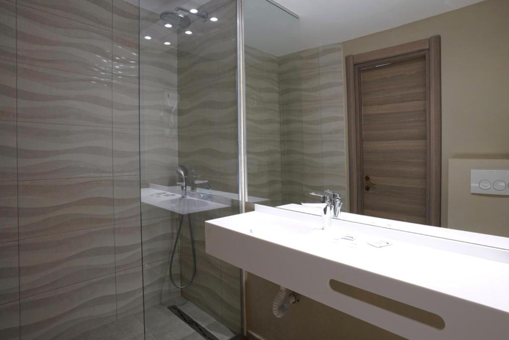 Koupelna v ubytování Hotel Opal
