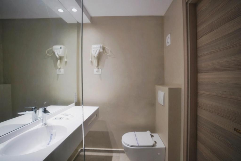 Koupelna v ubytování Hotel Opal