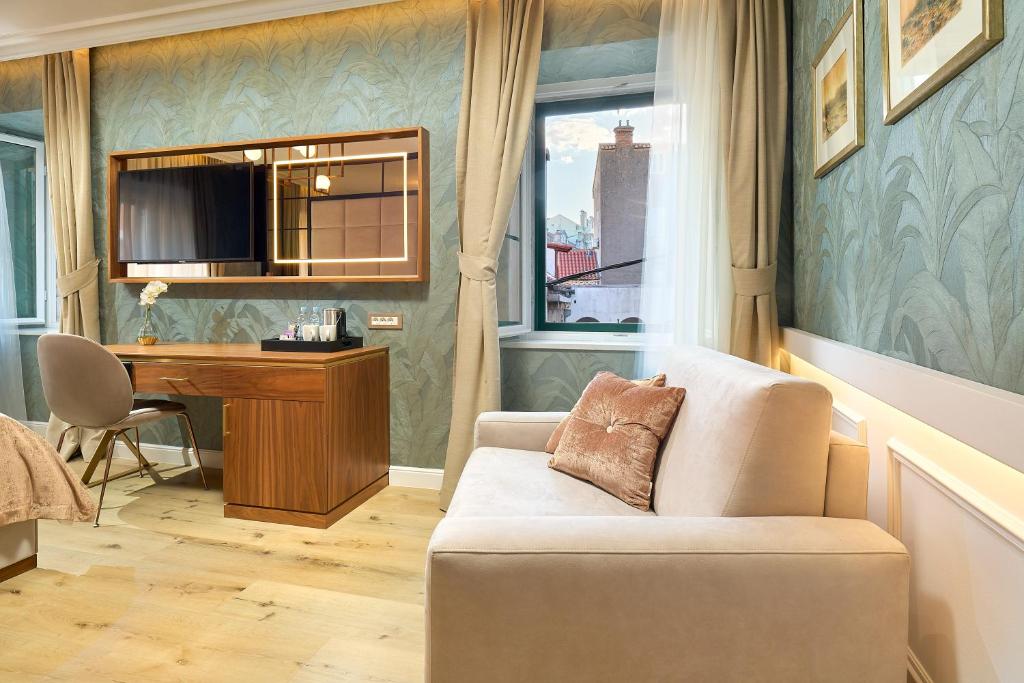 Posezení v ubytování Geremia Luxury Rooms