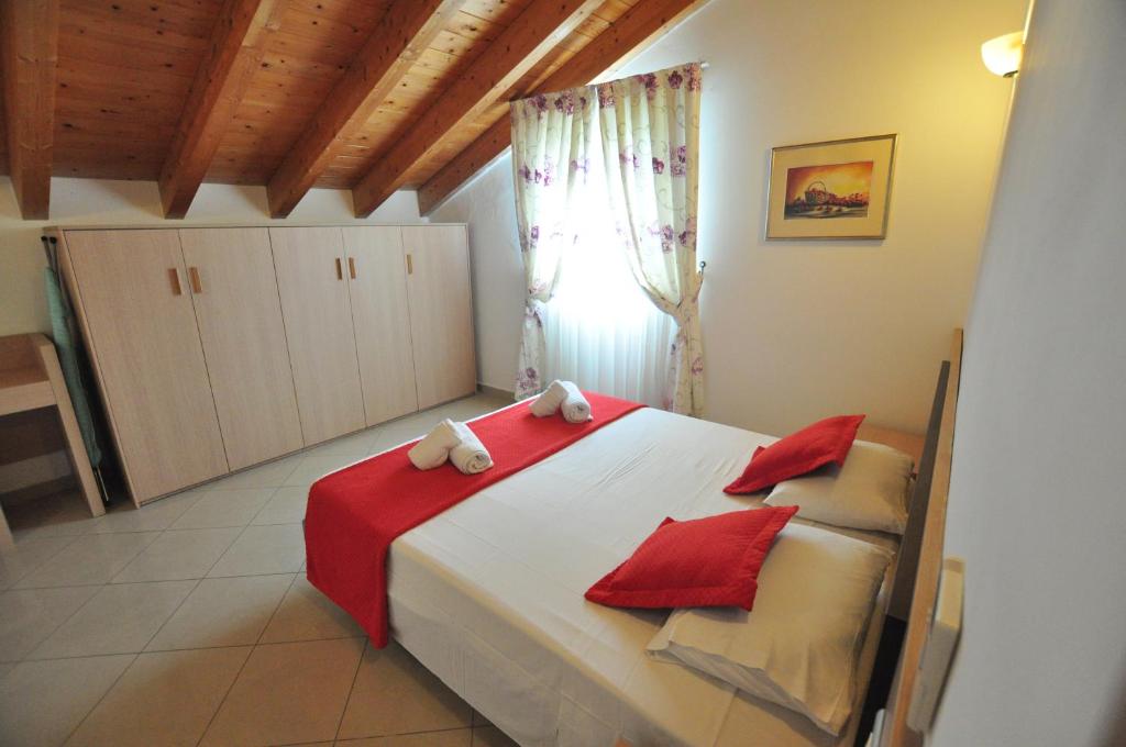 Postel nebo postele na pokoji v ubytování Michelangelo Resort