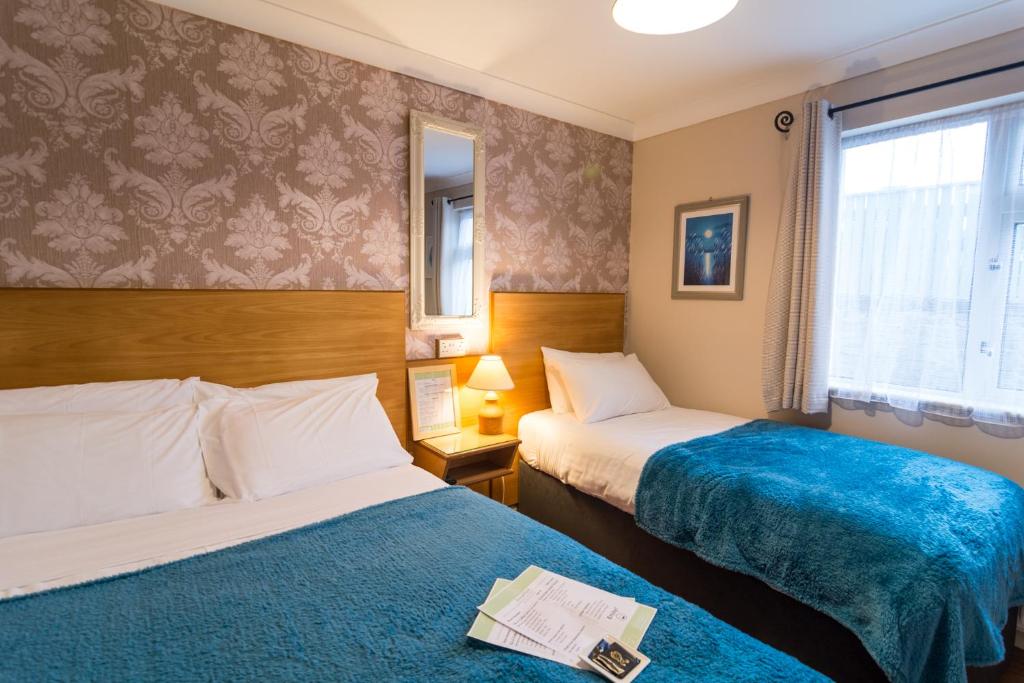 Postel nebo postele na pokoji v ubytování Seacrest B&B