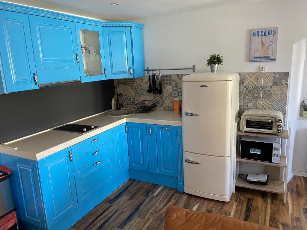 Kuchyňa alebo kuchynka v ubytovaní Apartman Volosko